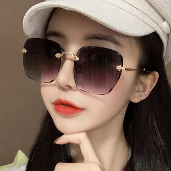2020 jaunu apgriešanas laukums bez rāmja saulesbrilles sieviešu han edition web slavenību apaļa seja bez grima saulesbrilles slīpums